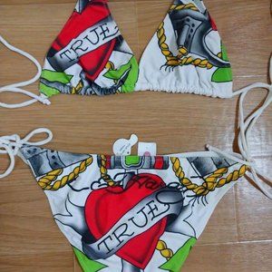 Ed Hardy women’s swimsuit bikini size Large in good clean condition never worn.